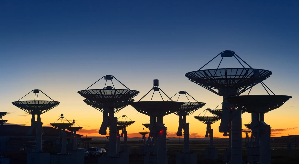 Observatory antenna in the sunset