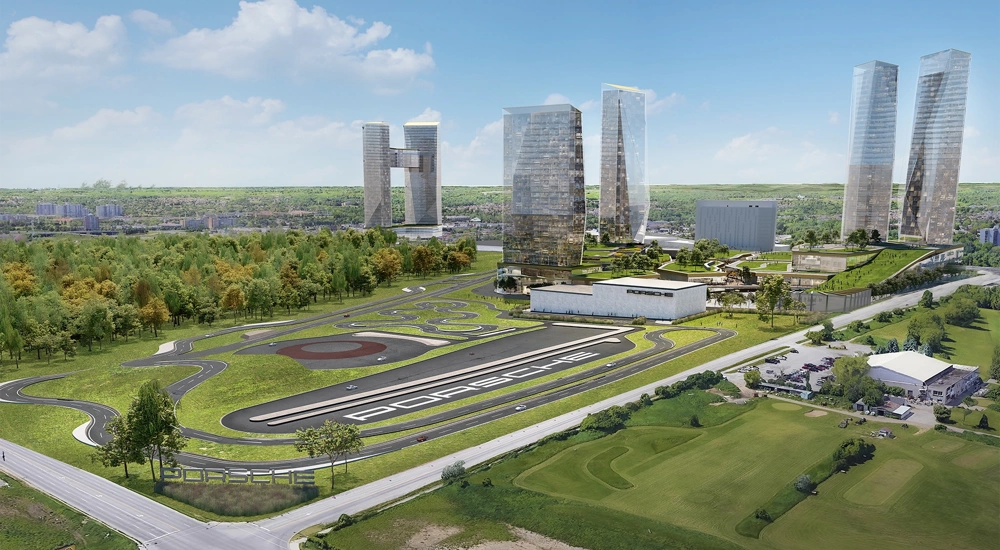 Aerial rendering of the Porsche Experience Centre, featuring race track and futuristic buildings, Toronto, Canada