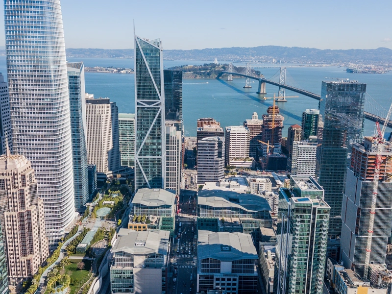 View of skyscrapers in America with sun beaming