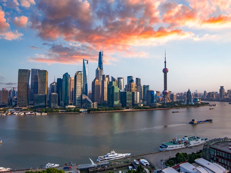 Sunset in Pudong, Shanghai captured on the rooftop of a high-rise building in Puxi