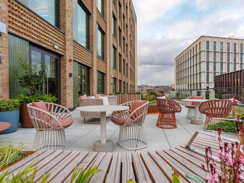 Spacious terrace with seating at One Blossom Yard, London, UK