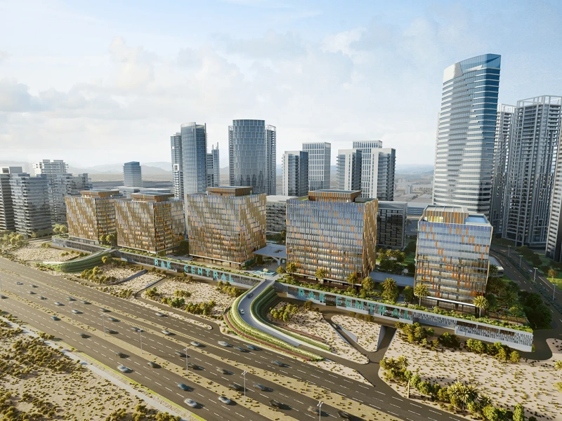 Aerial rendering of commercial mega-district redevelopment with silver and gold tower blocks, Ras Al Khaimah, UAE