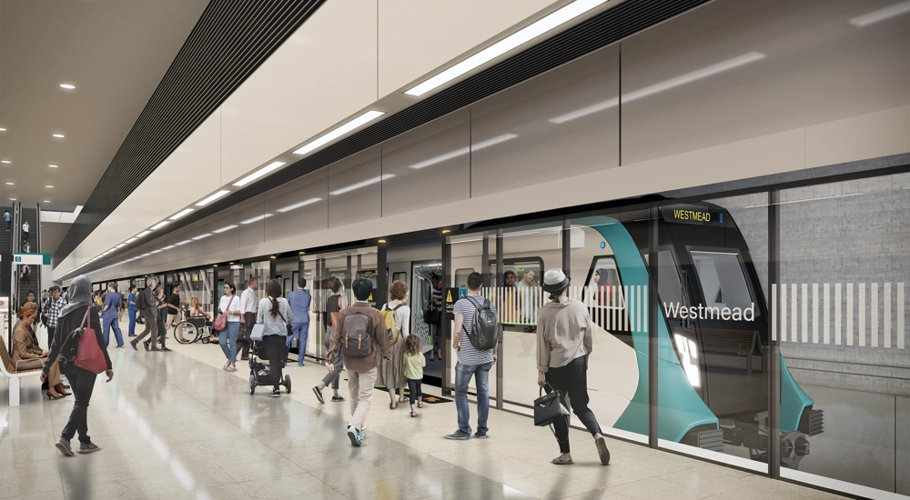 Sydney metro station train platform with passengers.