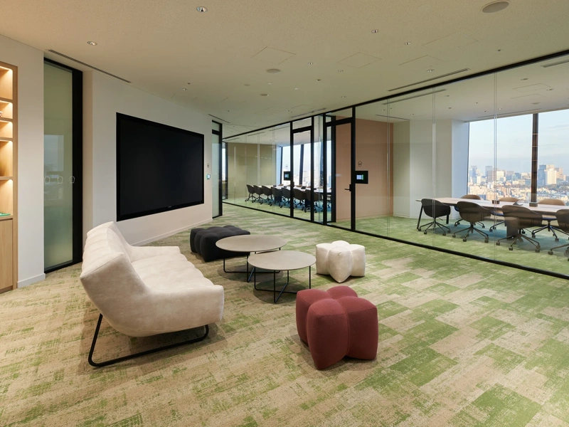 Interior of Kraft Heinz Japan office with carpeted lounge, boardroom and skyline view, Tokyo, Japan