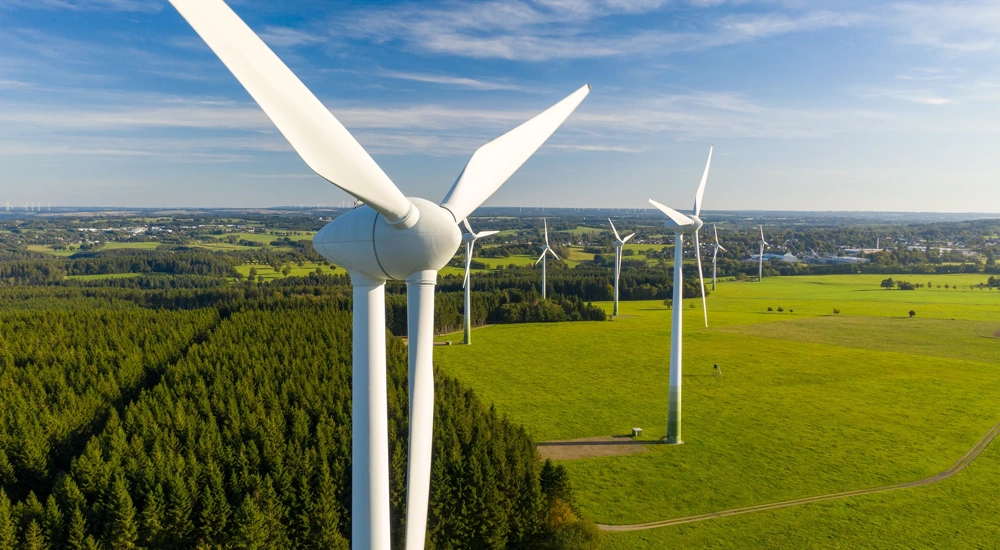 Wind turbines on a green field