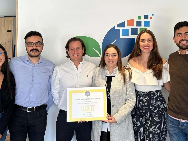 Group of people holding certificate