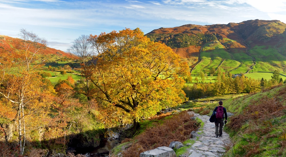 Male hiker exploring the Great Langdale Valley in the Lake District