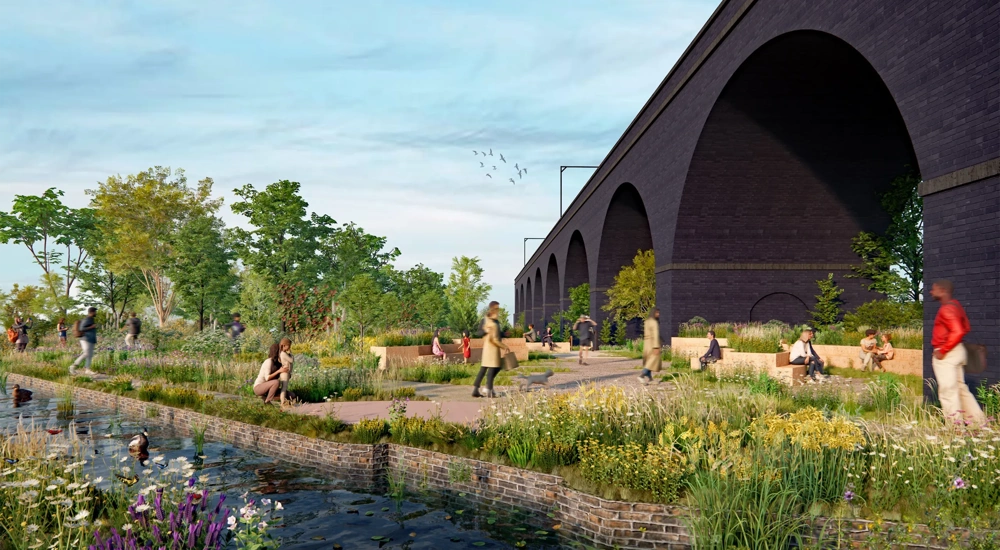 image of SMG canal with green grass and plants and people walking past.