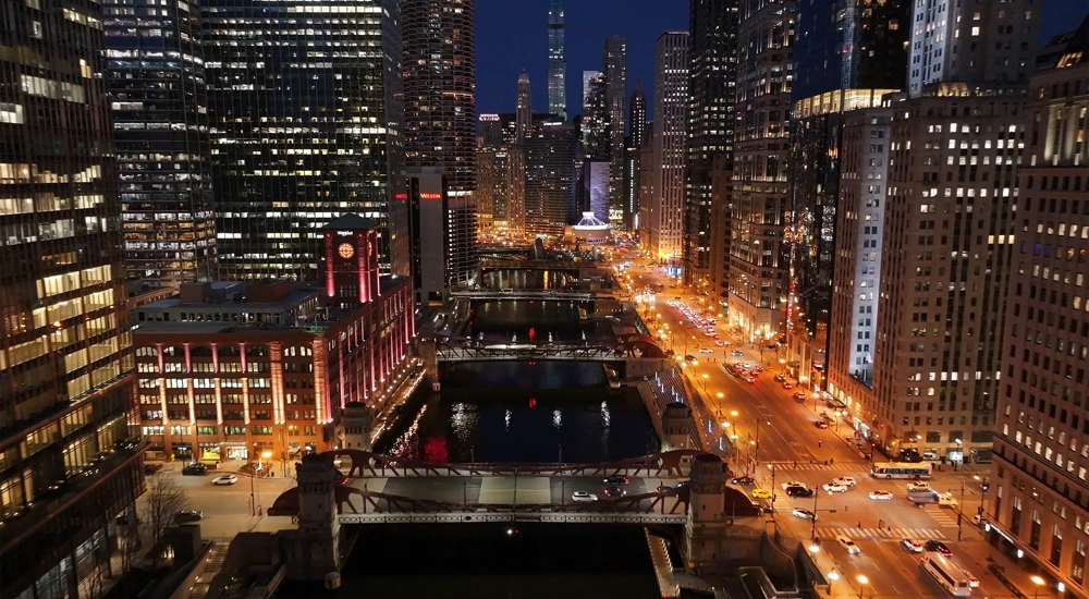 Night Chicago Skyline At Chicago In Illinois United States. Illuminated Downtown. City At Night Landscape. Chicago At Illinois United States. Chicago City District. City Skyline Scene.