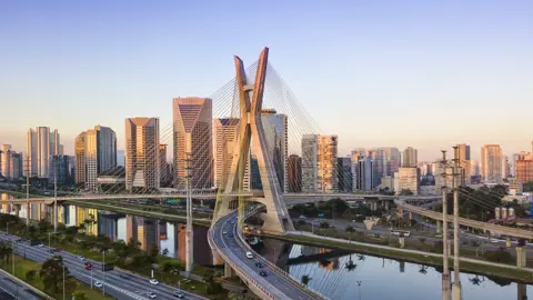 Aerial view of the famous cable-stayed bridge of Sao Paulo city with blue sky.