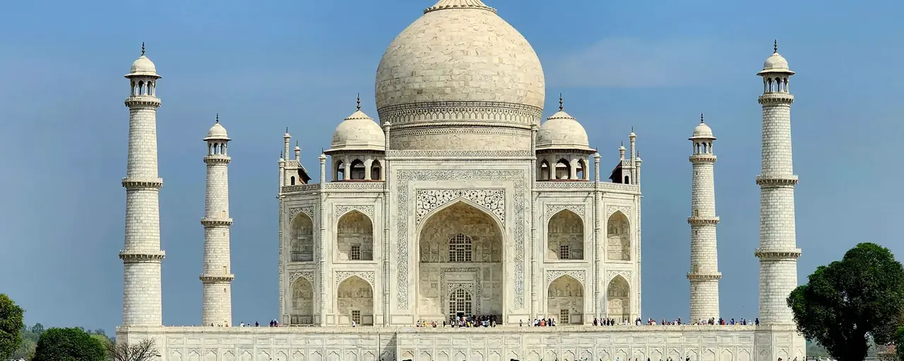 View of the Taj Mahal on a busy sunny day