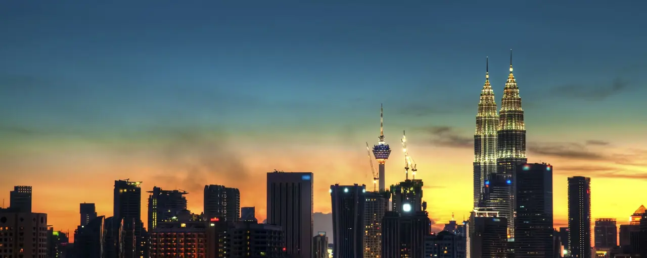 Skyline photo of Kuala Lumpur at dusk or dawn