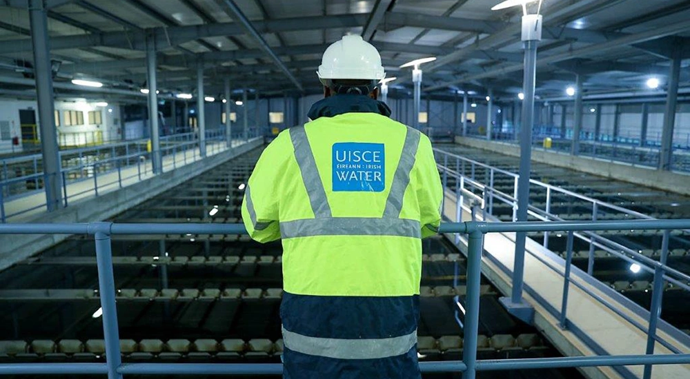 Man in high vis inside a project site
