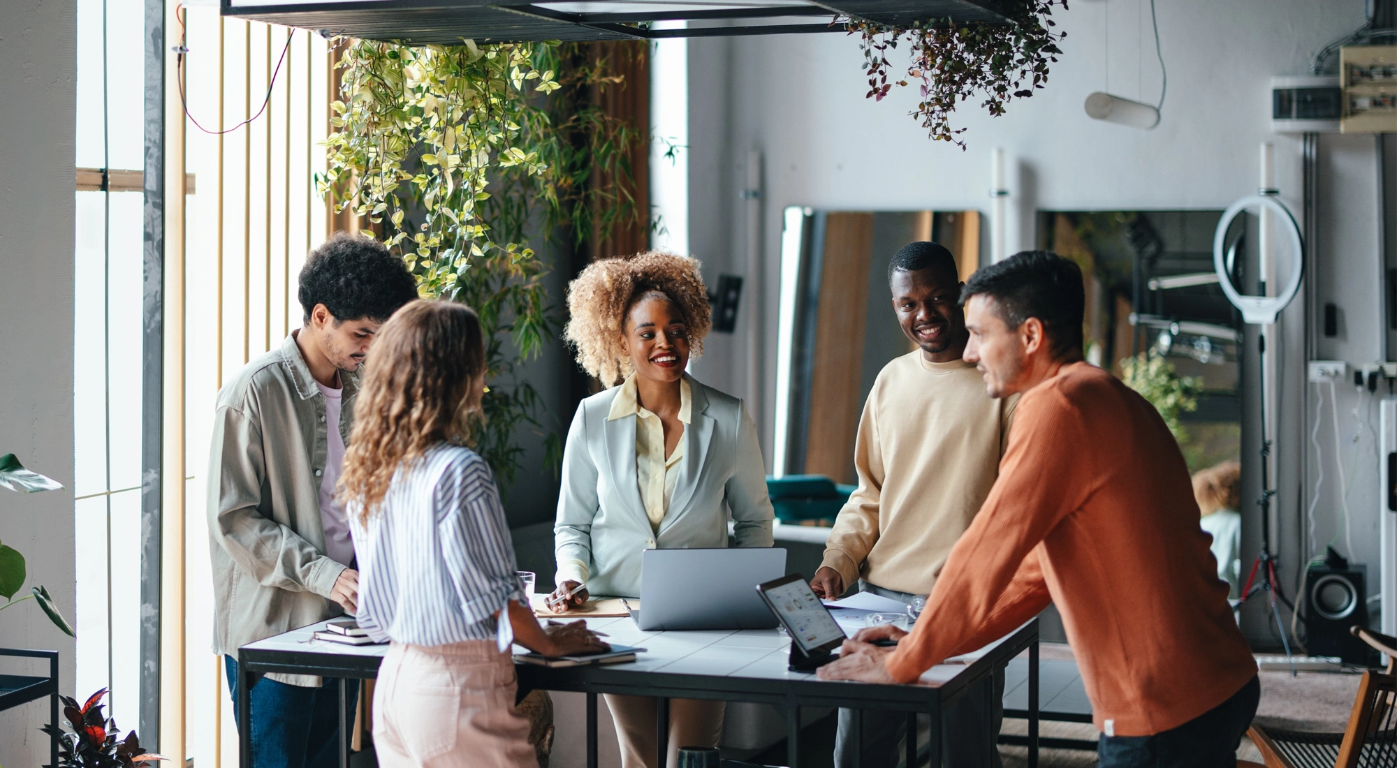 A Group Of Happy Multiethnic Businesspeople Working Together In The Office.