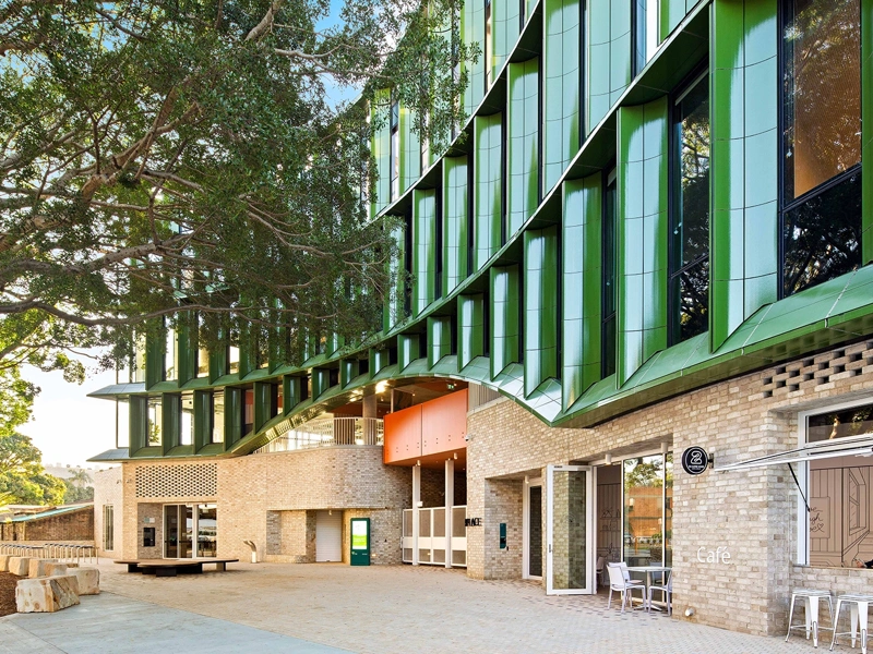 The exterior of Yarrila Place with modern green panelling, New South Wales, Australia
