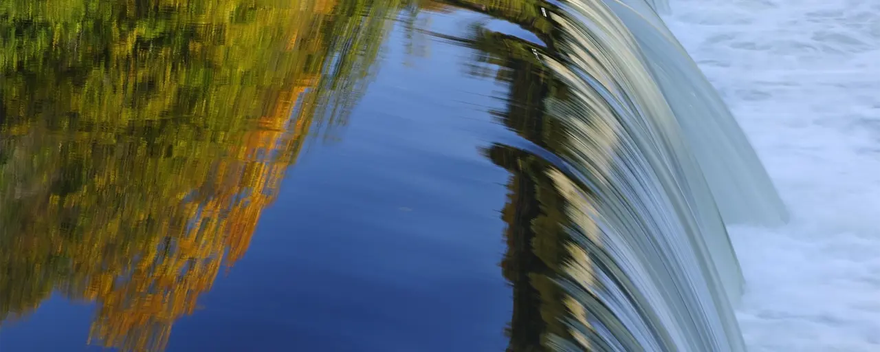 Water flowing over a weir