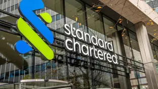 Standard Chartered office front with logo.