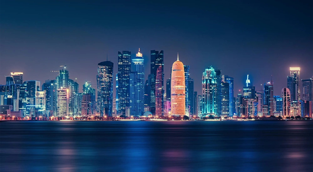 Futuristic Modern Skyline with Reflection in the Still Corniche Bay Waters, Last of the Sunlight Falling on the Buildings.